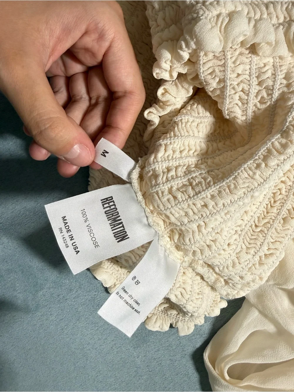 Reformation Cream Smocked Long-Sleeve Crop Top